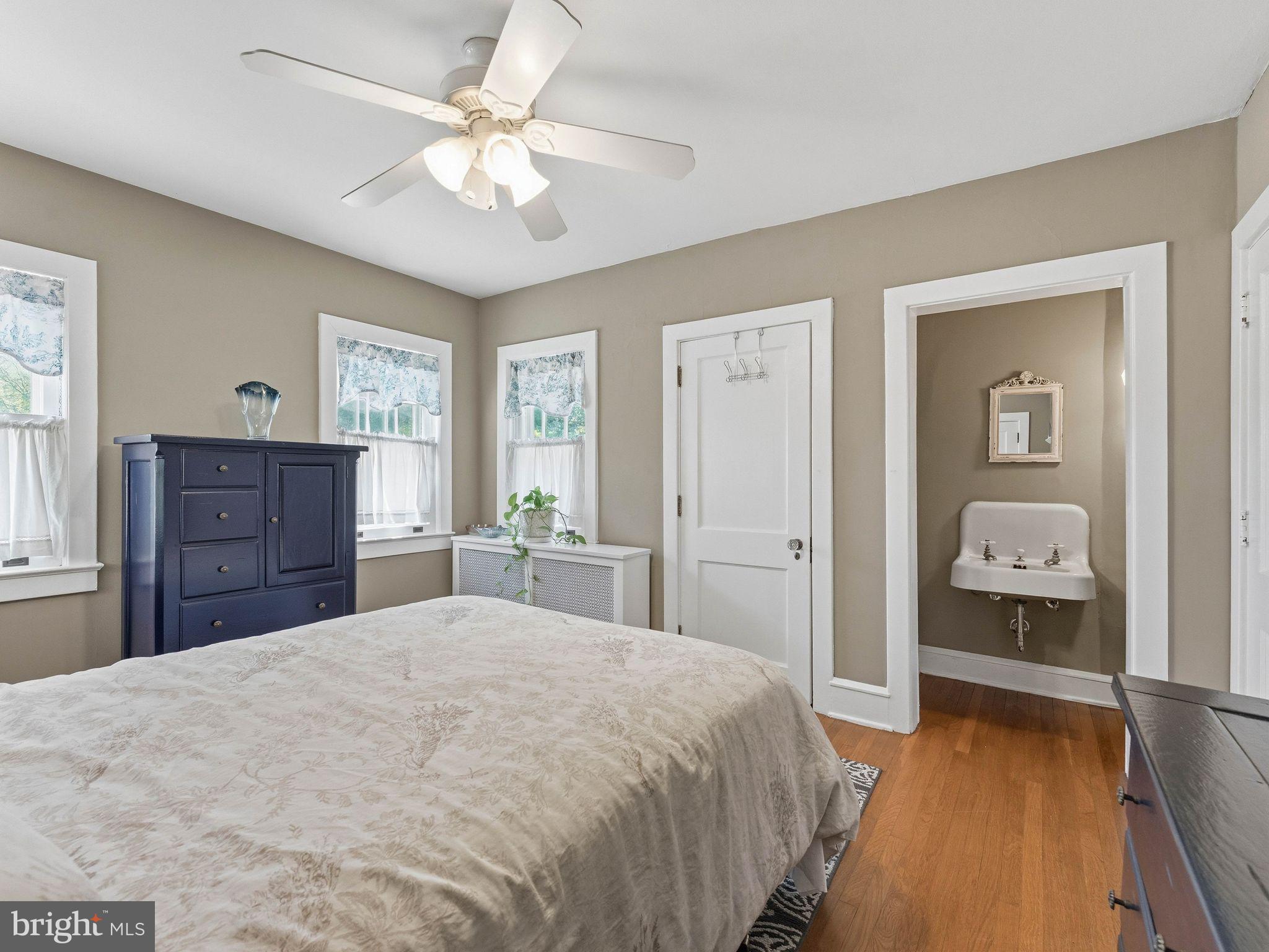 229 North Main Street Woodstown, NJ 08098 - Photo 38 of 74 a bedroom with a bed and a dresser