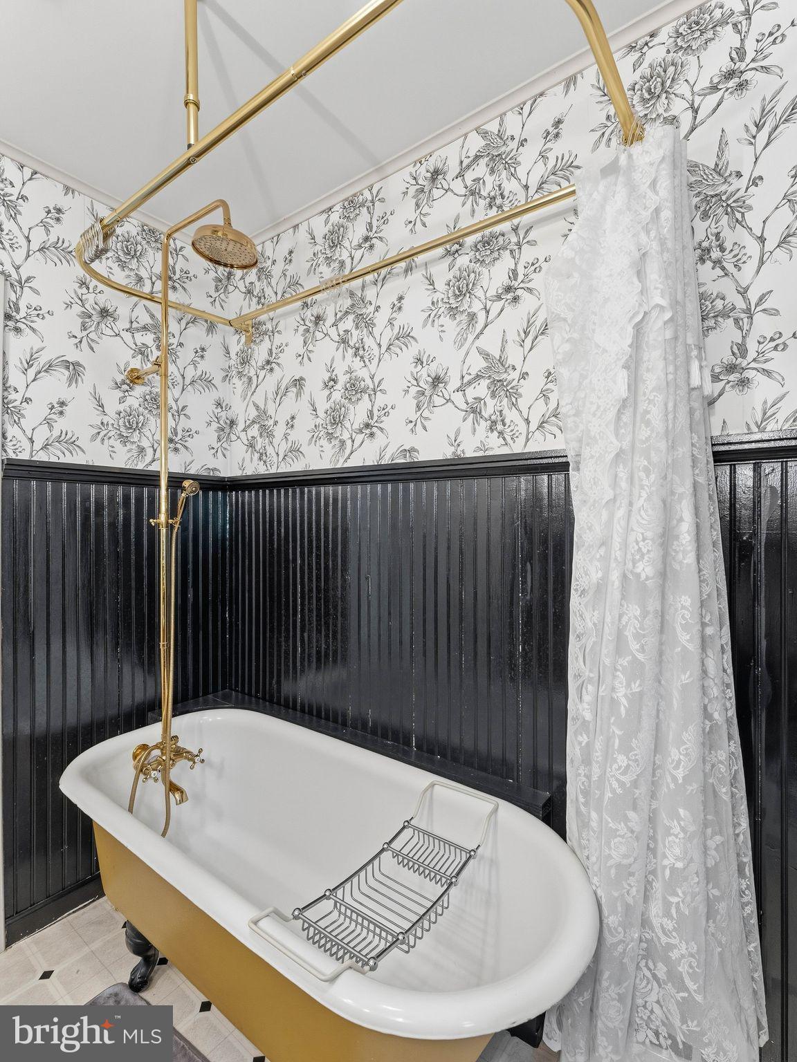 229 North Main Street Woodstown, NJ 08098 - Photo 42 of 74 a white bath tub sitting in a bathroom