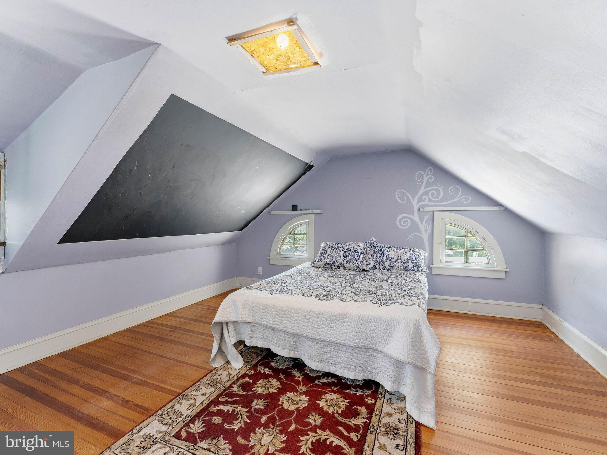 229 North Main Street Woodstown, NJ 08098 - Photo 43 of 74 a bedroom with a bed and a dresser