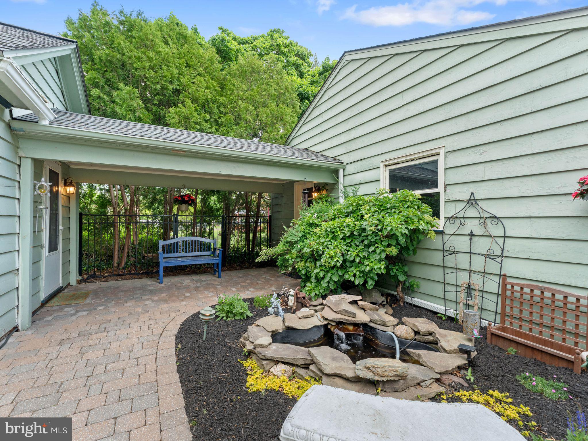 229 North Main Street Woodstown, NJ 08098 - Photo 7 of 74 Koi Pond and Breezeway between House and Garage