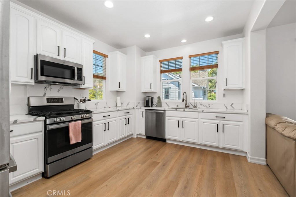 10 Thorp Ladera Ranch, CA 92694 - Photo 12 of 37 The kitchen showcases quartz countertops