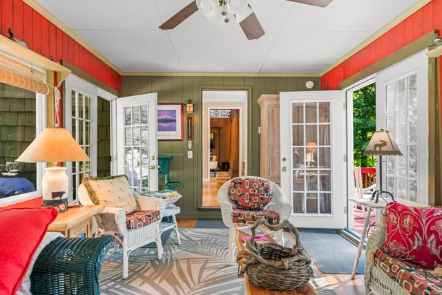 a bedroom with furniture and a window