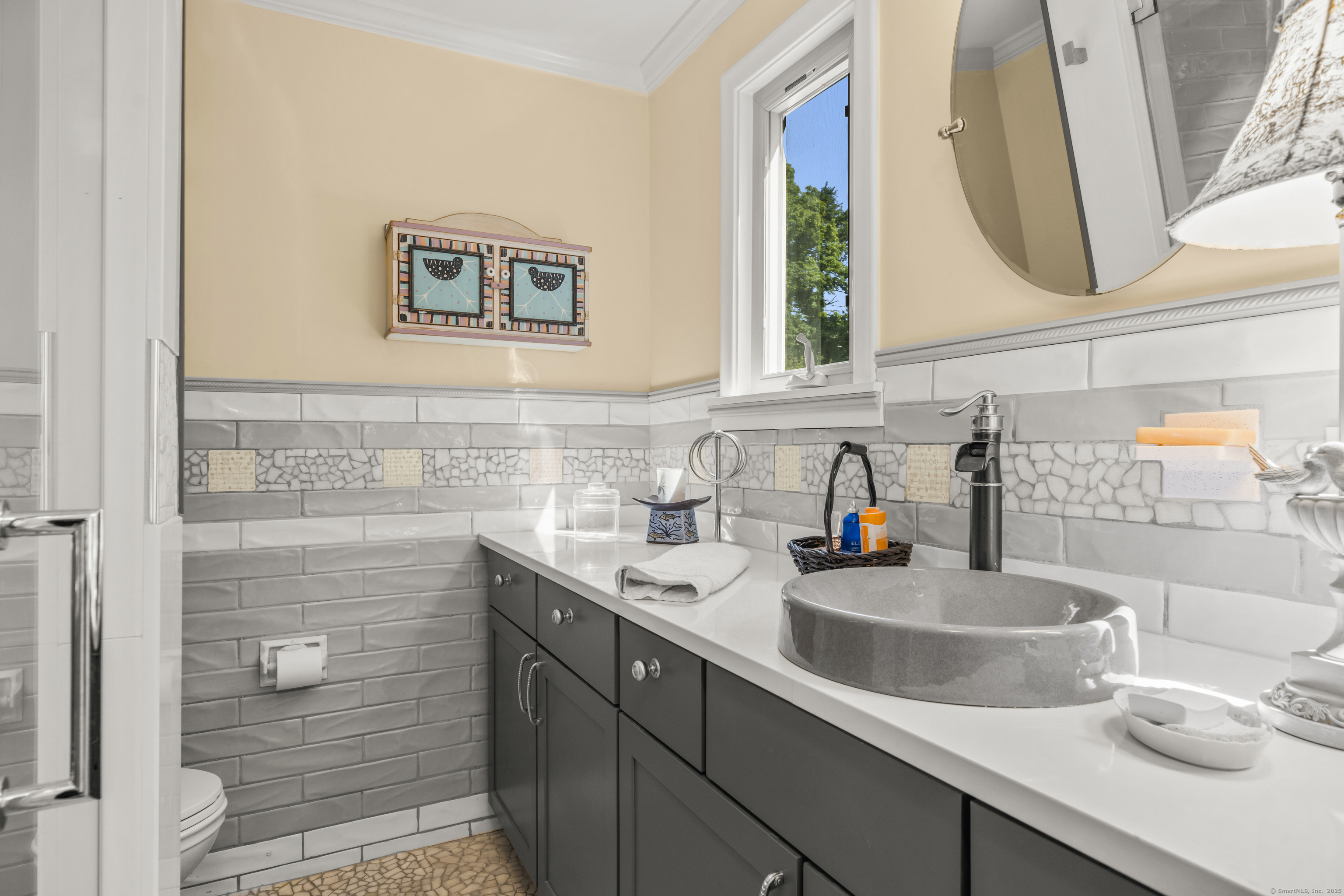 92 Kenmore Road Bloomfield, CT 06002 - Photo 22 of 38 a bathroom with a sink and a mirror