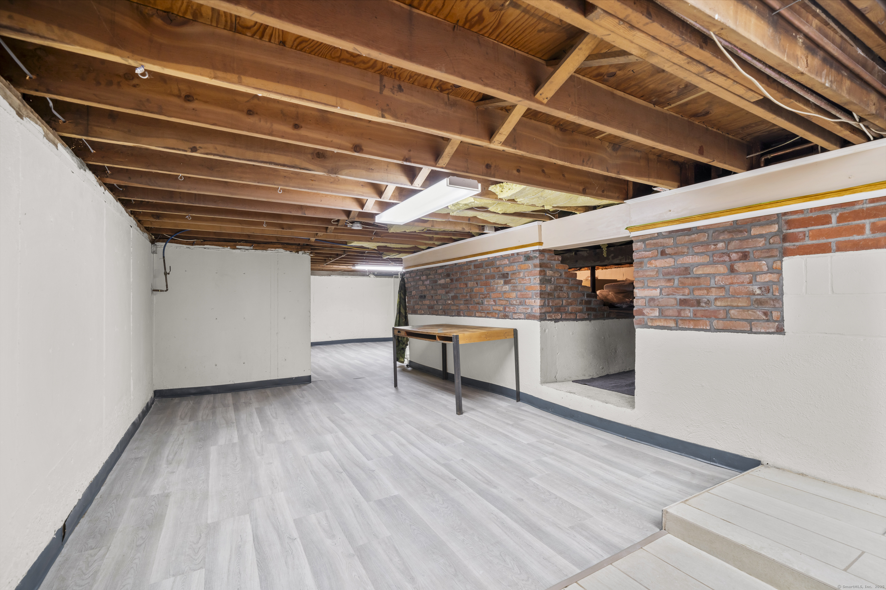 92 Kenmore Road Bloomfield, CT 06002 - Photo 24 of 38 a view of a room with wooden floor