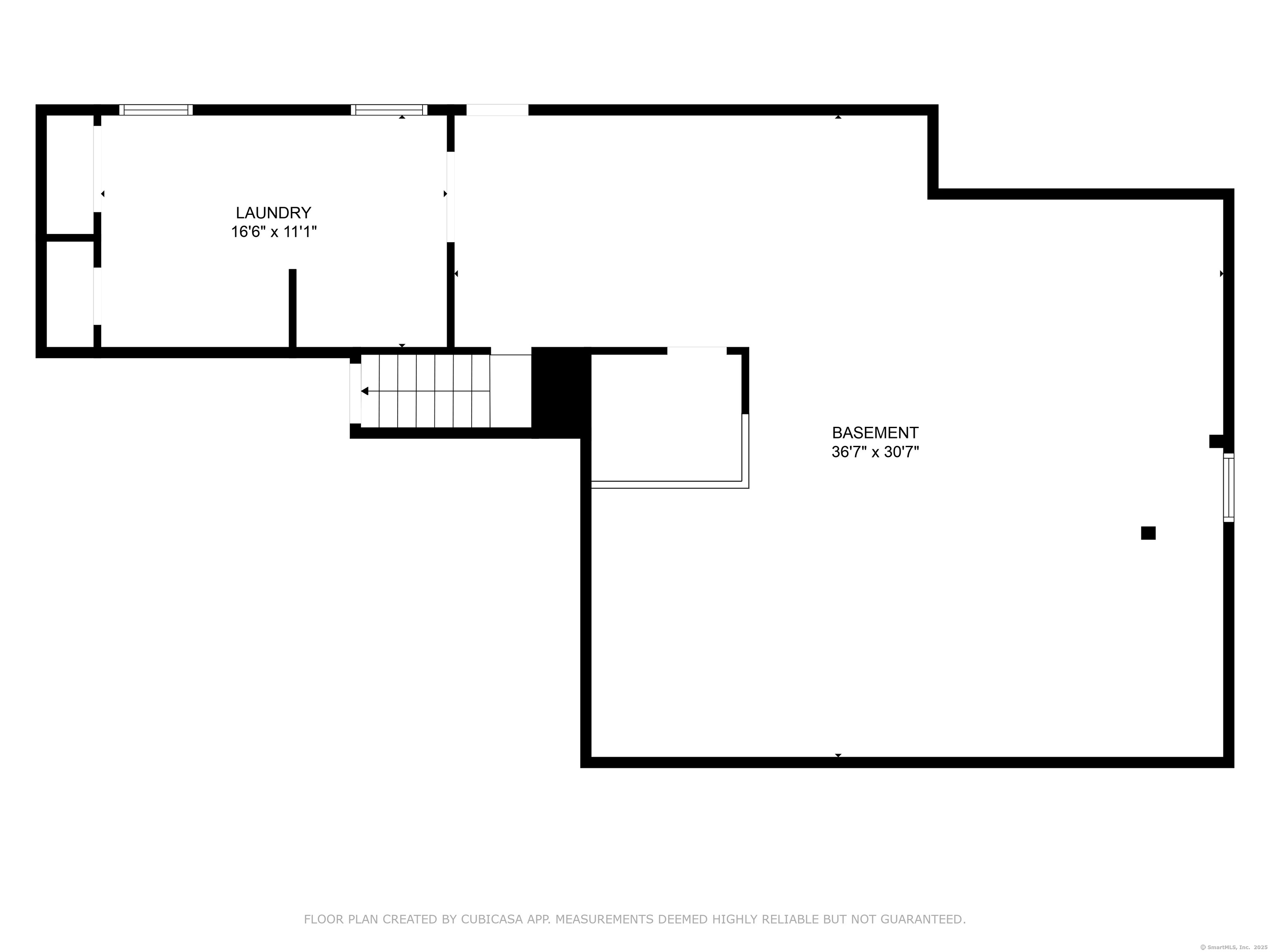 92 Kenmore Road Bloomfield, CT 06002 - Photo 37 of 38 a picture of a room with a white wall and a refrigerator
