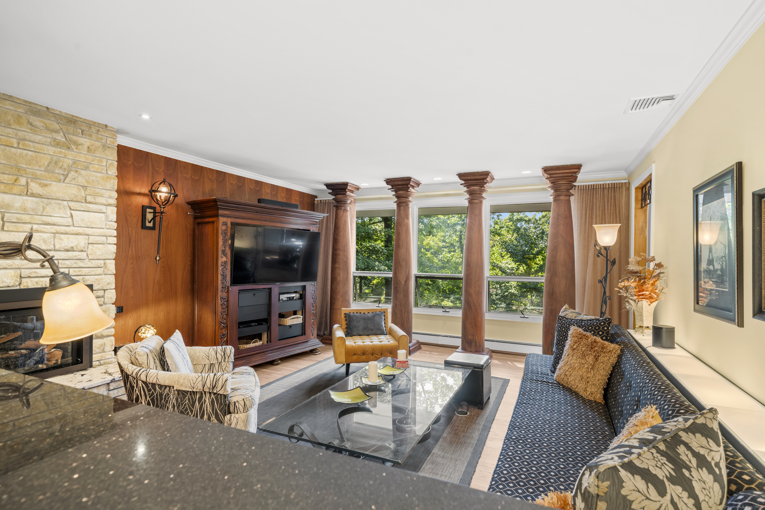 92 Kenmore Road Bloomfield, CT 06002 - Photo 6 of 38 a living room with furniture and large windows