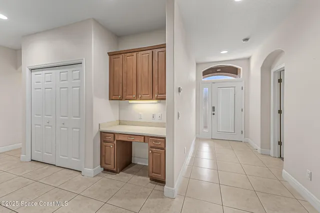 a view of a kitchen with an entryway