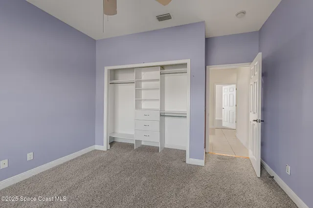 wooden floor and closet in a room
