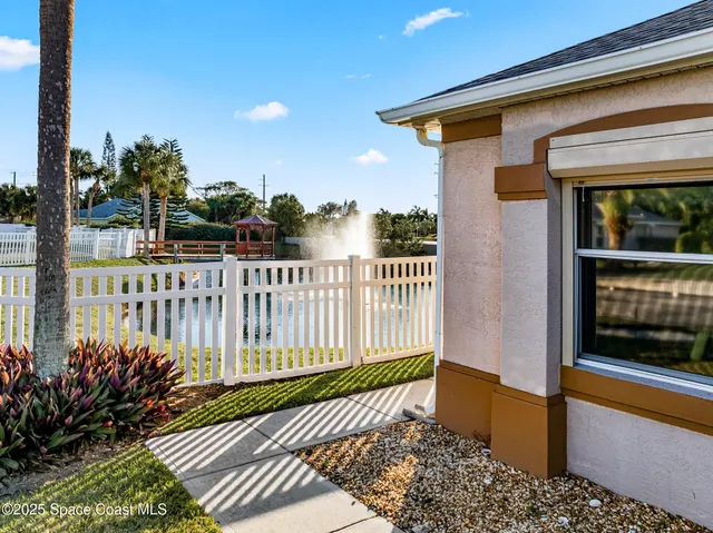 a house view with a garden space
