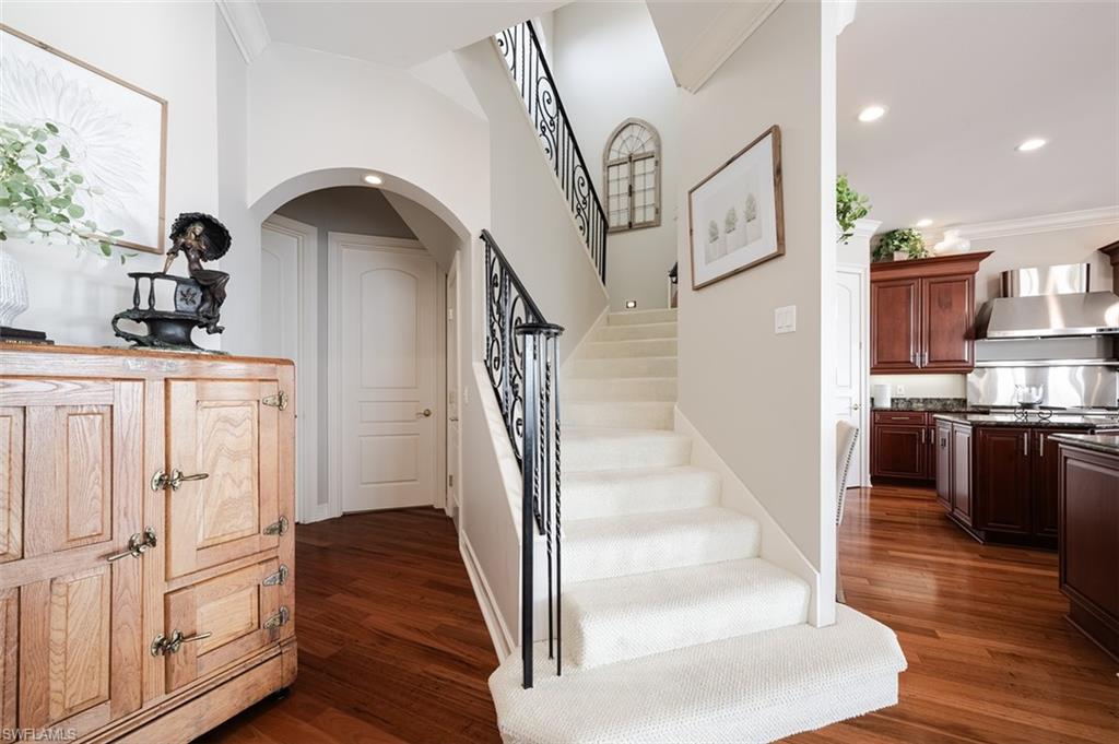 1942 Kingfish Road Naples, FL 34102 - Photo 28 of 43 a view of entryway and hall with wooden floor