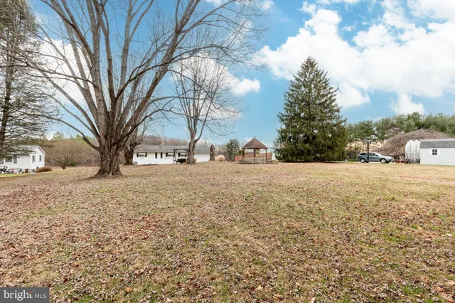 a view of snow covered with snow in front of house