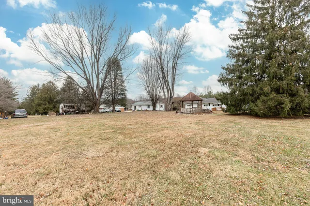 a view of yard covered with snow