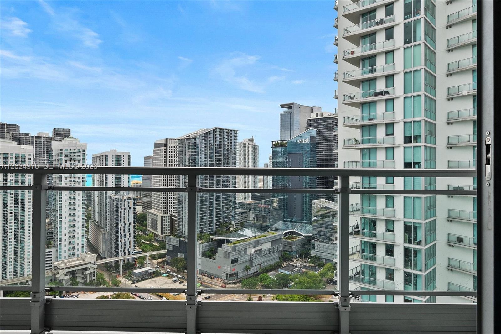 90 Southwest 3rd Street, Unit 3810 Miami, FL 33130 - Photo 11 of 45 a view of a tall building from a balcony