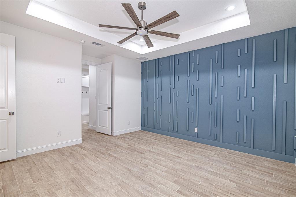 204 High Rdg Court Godley, TX 76044 - Photo 20 of 28 an empty room with fan and windows