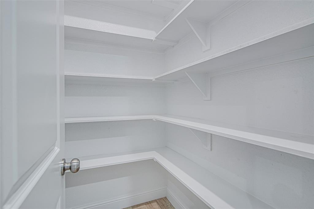 204 High Rdg Court Godley, TX 76044 - Photo 7 of 28 a view of an empty walk in closet