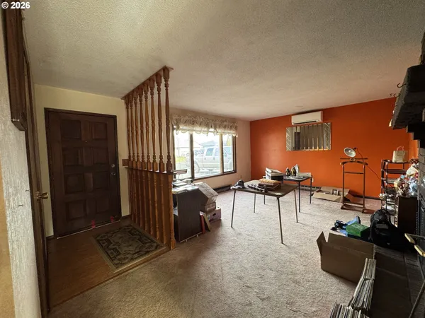 a view of a livingroom with furniture and a couch