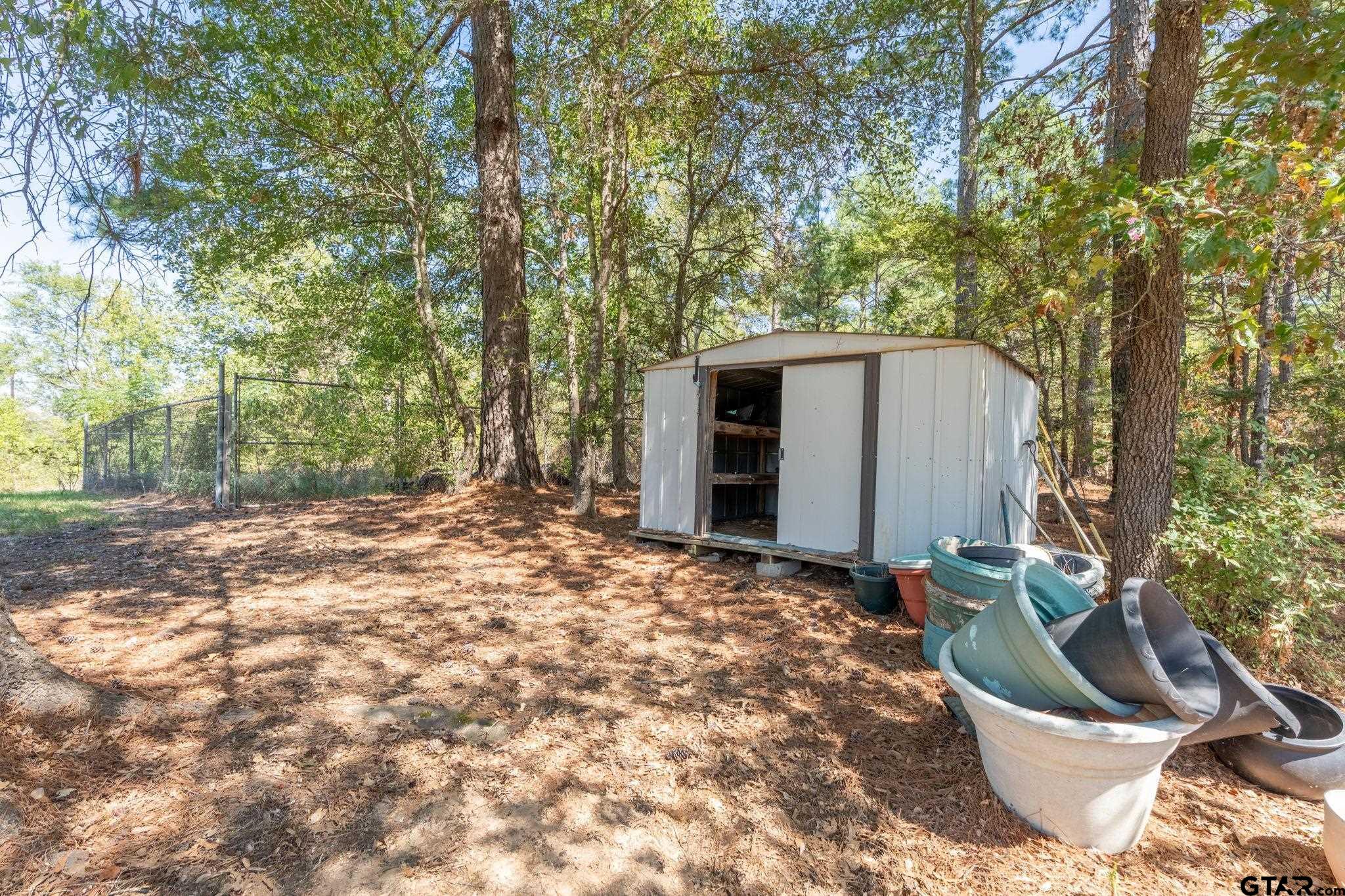 18596 County Road 2154 Troup, TX 75789 - Photo 20 of 21 a view of a small yard in front of house