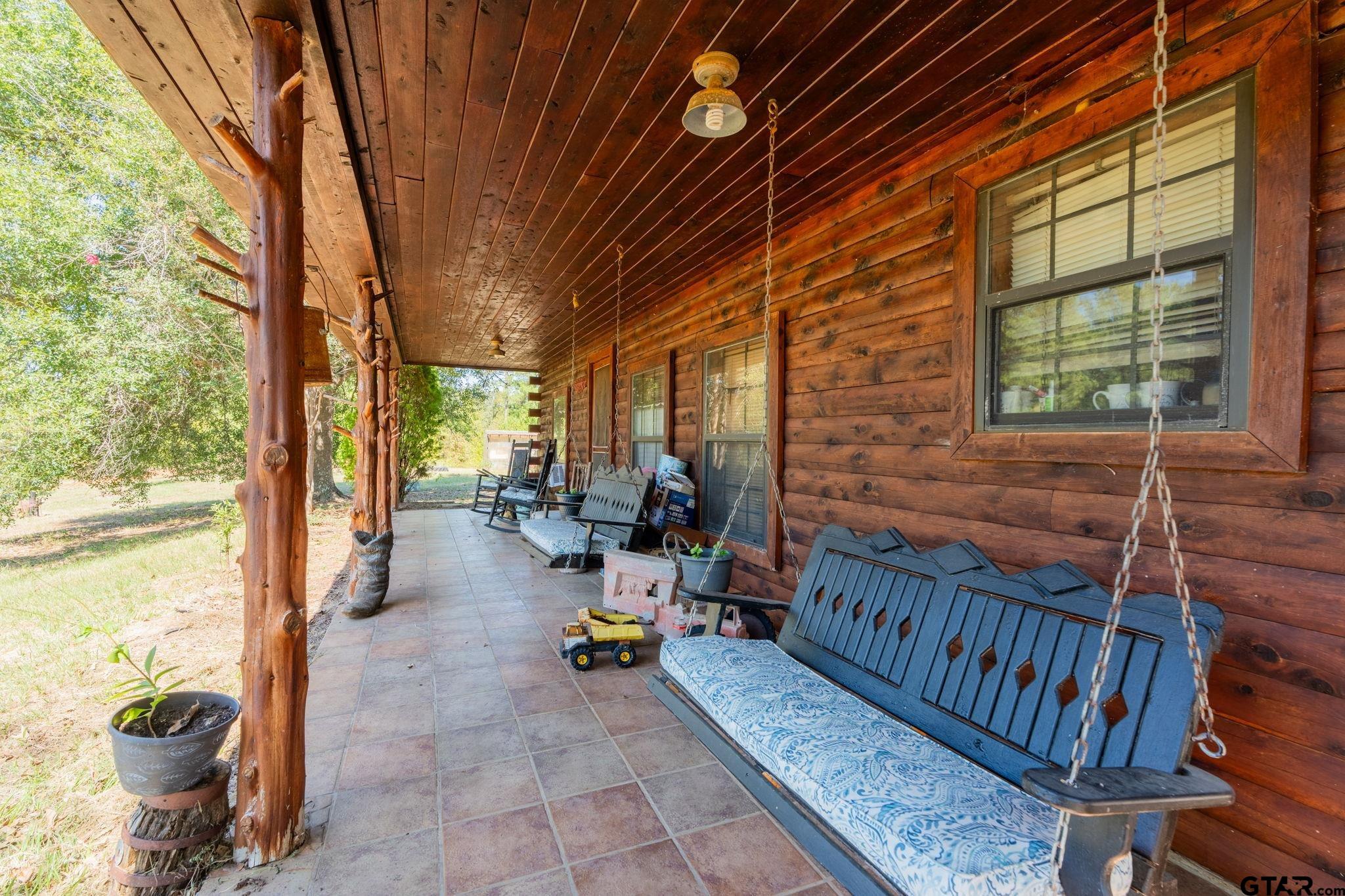 18596 County Road 2154 Troup, TX 75789 - Photo 2 of 21 a view of porch with seating space