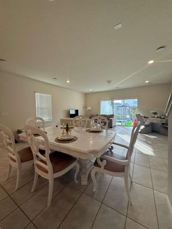 2579 Winsome Way Davenport, FL 33896 - Photo 6 of 25 a view of a dining area with furniture