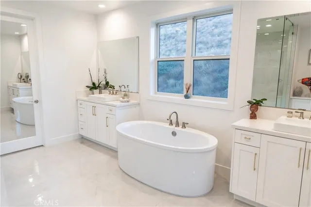 a bathroom with a sink and a bathtub