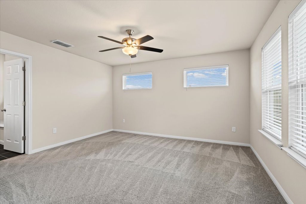 6313 Mary Lewis Drive Austin, TX 78747 - Photo 10 of 20 a view of an empty room with a window