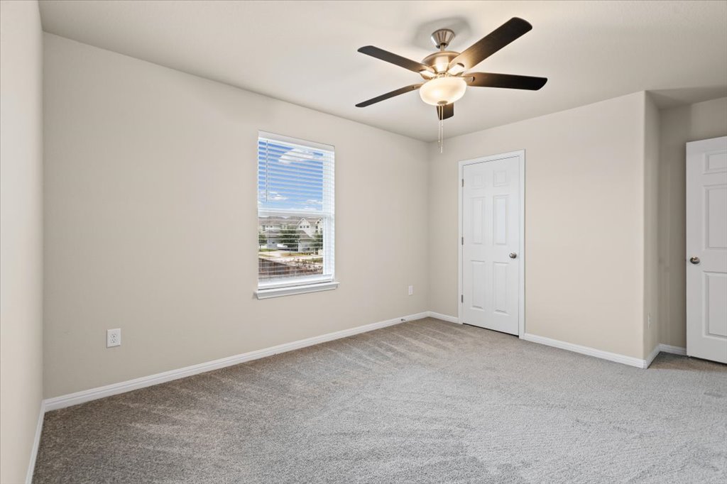 6313 Mary Lewis Drive Austin, TX 78747 - Photo 13 of 20 a view of an empty room with a window