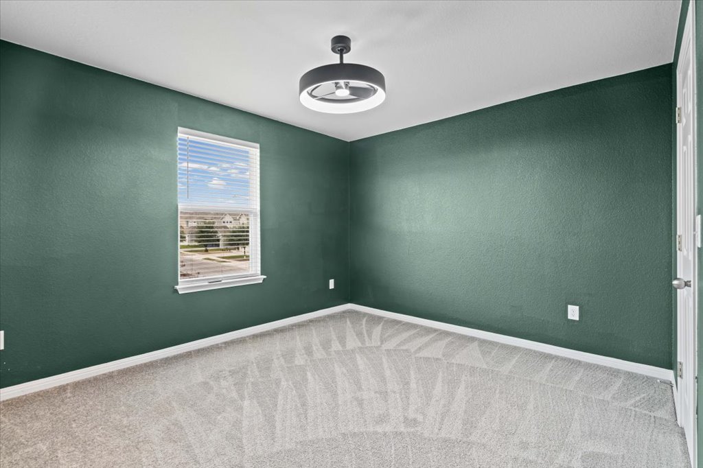 6313 Mary Lewis Drive Austin, TX 78747 - Photo 15 of 20 an empty room and window