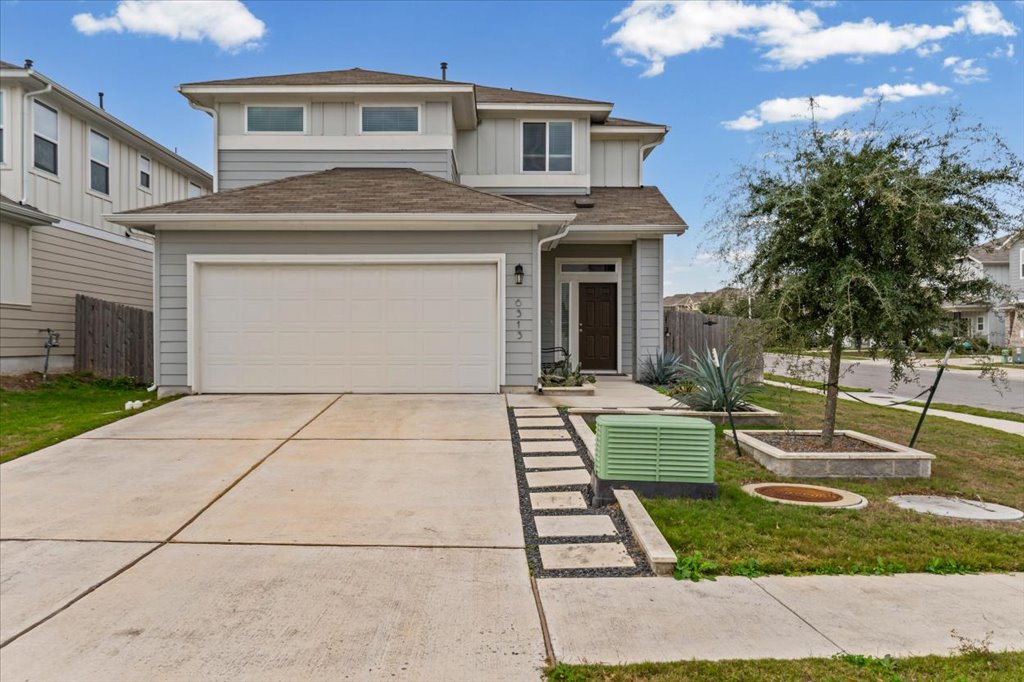 6313 Mary Lewis Drive Austin, TX 78747 - Photo 2 of 20 a view of a yard with car parked