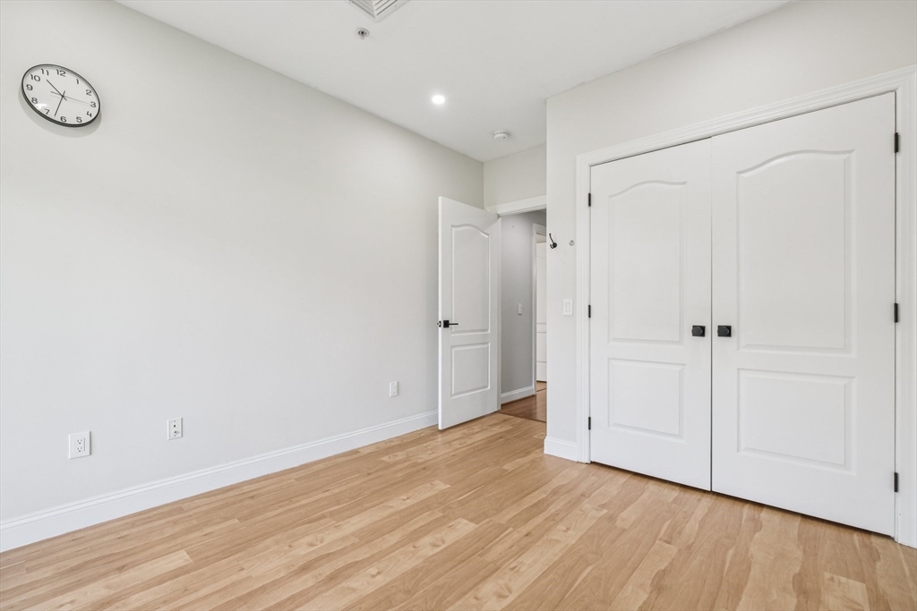 614 Pond Street, Unit 2104 Braintree, MA 02184 - Photo 14 of 29 a view of an empty room