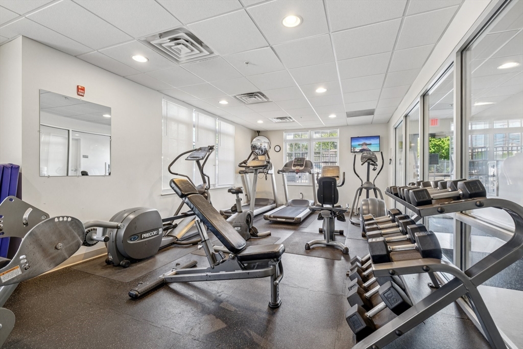 614 Pond Street, Unit 2104 Braintree, MA 02184 - Photo 22 of 29 a view of a room with gym equipment