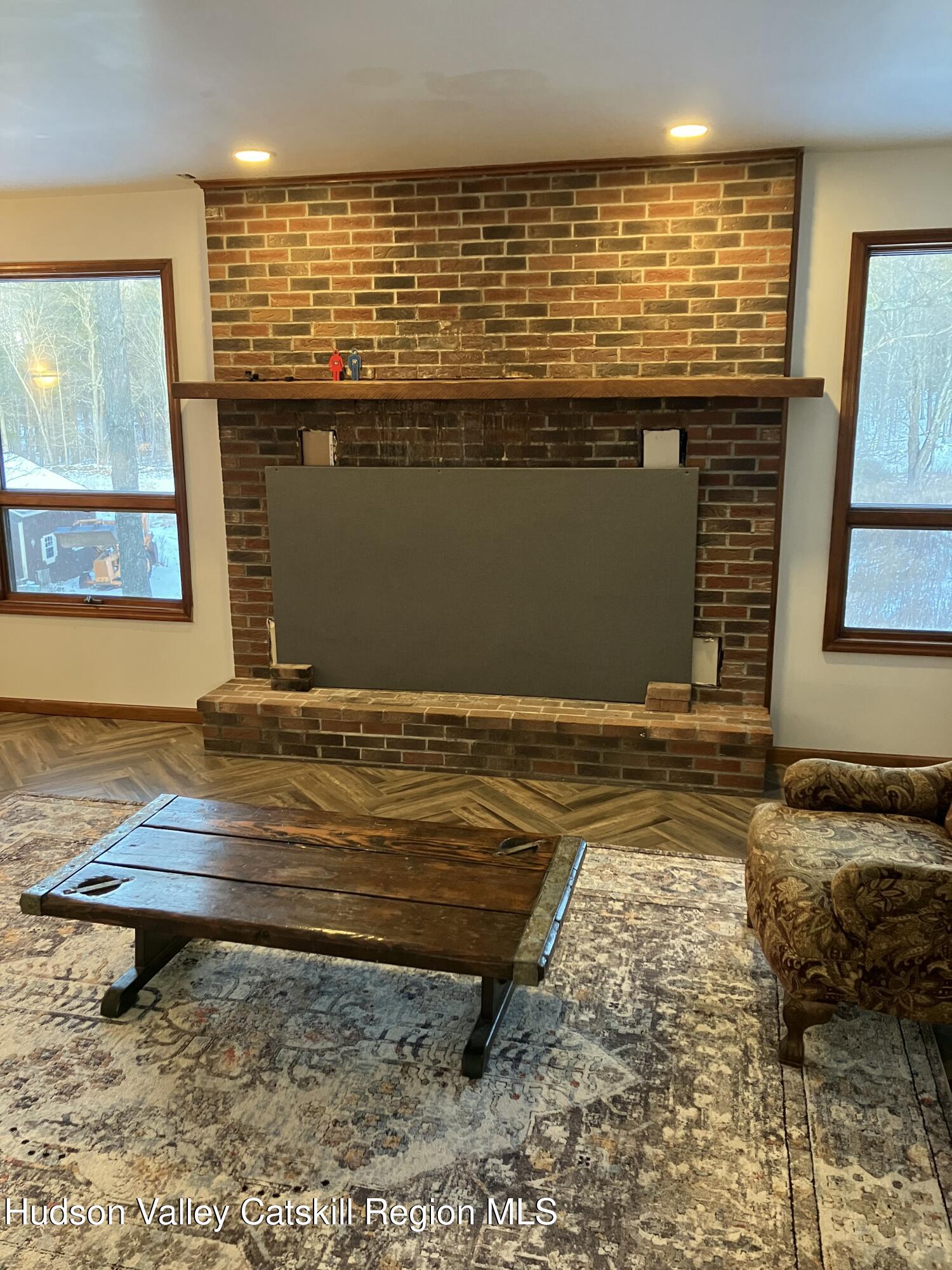 38 Bethel Ridge Road Catskill, NY 12414 - Photo 11 of 52 a view of a room with wooden floor and a window