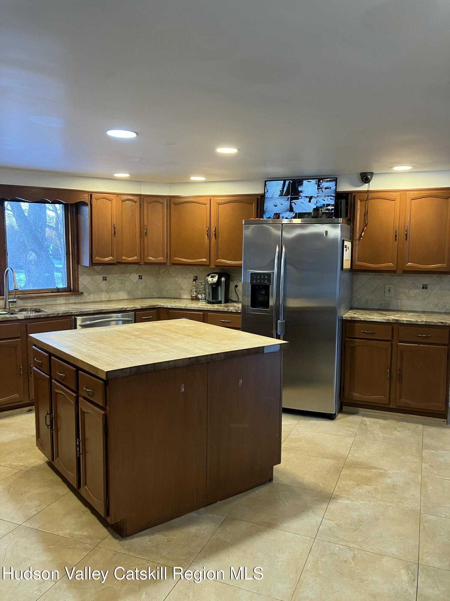 38 Bethel Ridge Road Catskill, NY 12414 - Photo 16 of 52 a kitchen with stainless steel appliances granite countertop a sink counter space and stainless steel appliances