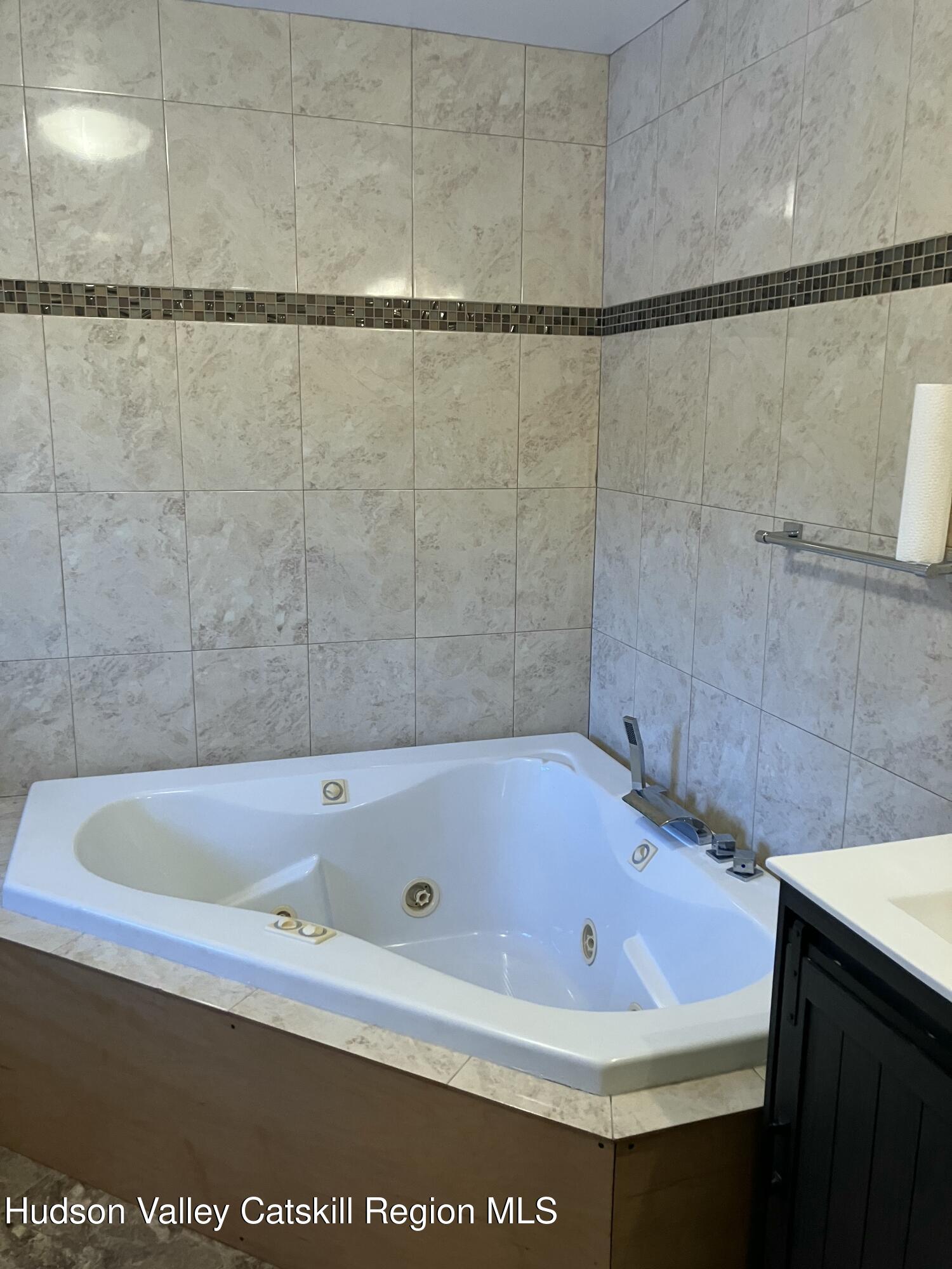 38 Bethel Ridge Road Catskill, NY 12414 - Photo 34 of 52 a bathroom with a bath tub and a shower
