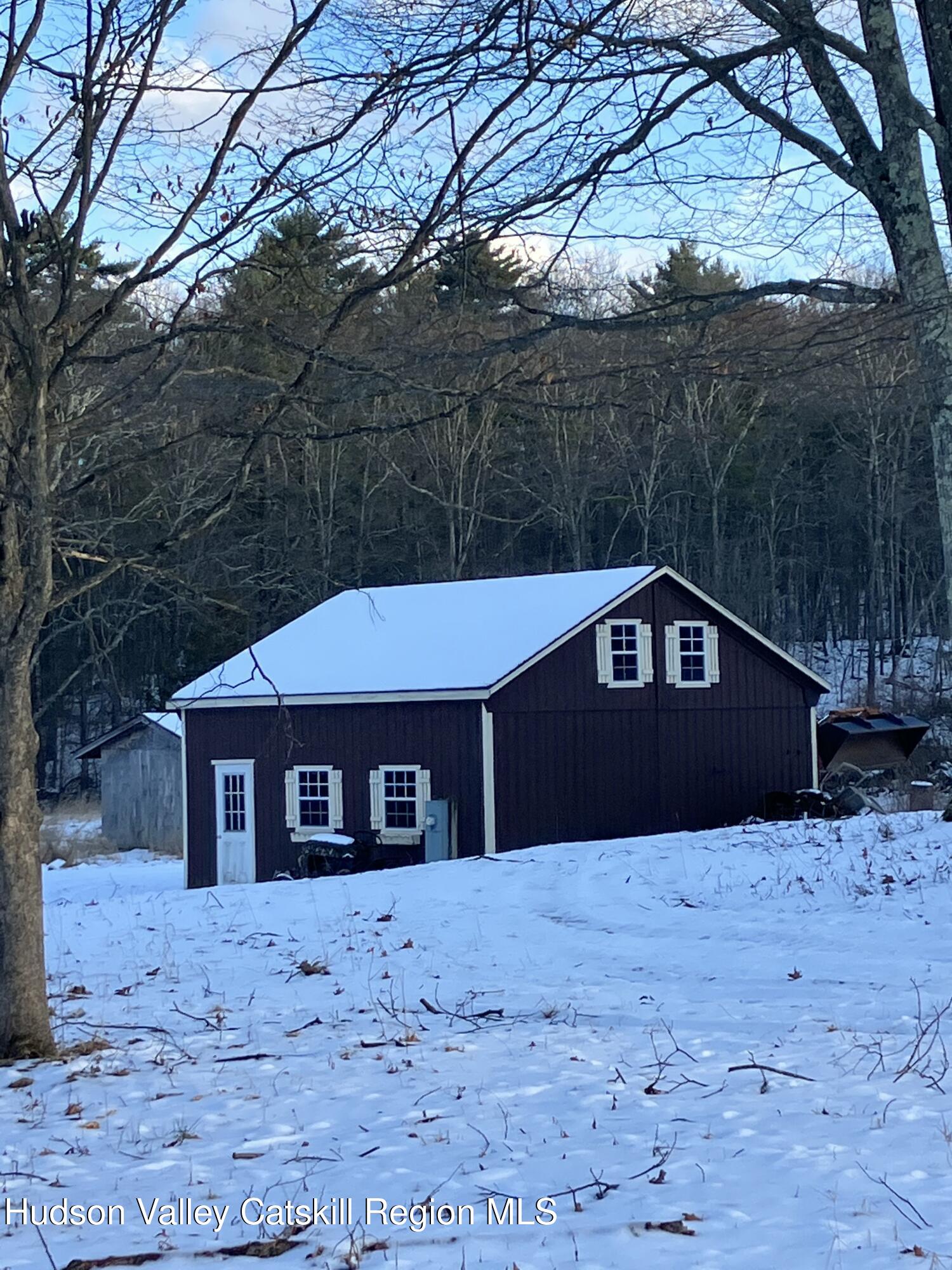 38 Bethel Ridge Road Catskill, NY 12414 - Photo 8 of 52 a front view of a house with a yard