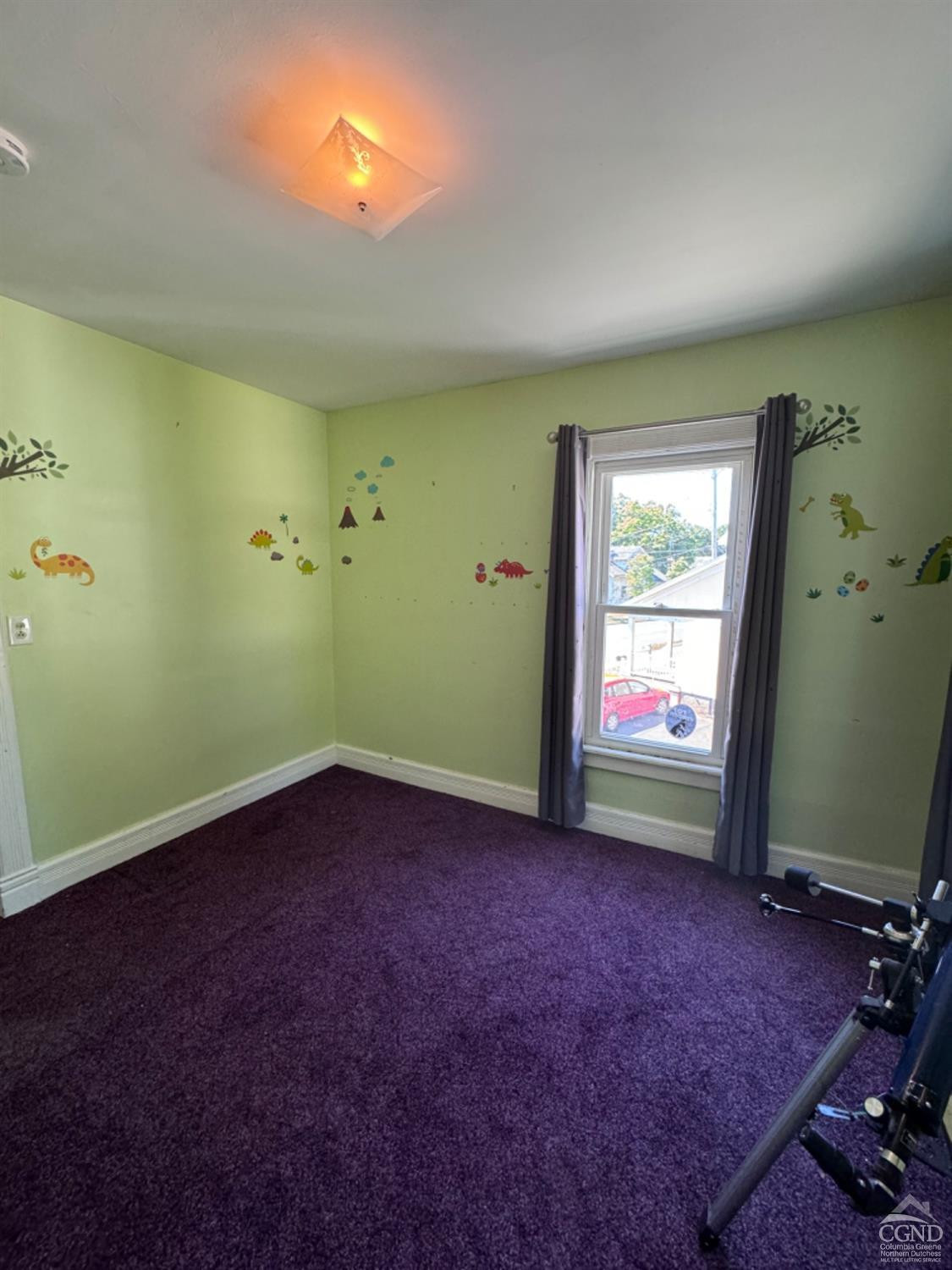 95 Maple Avenue Catskill, NY 12414 - Photo 17 of 25 an empty room with windows and closet