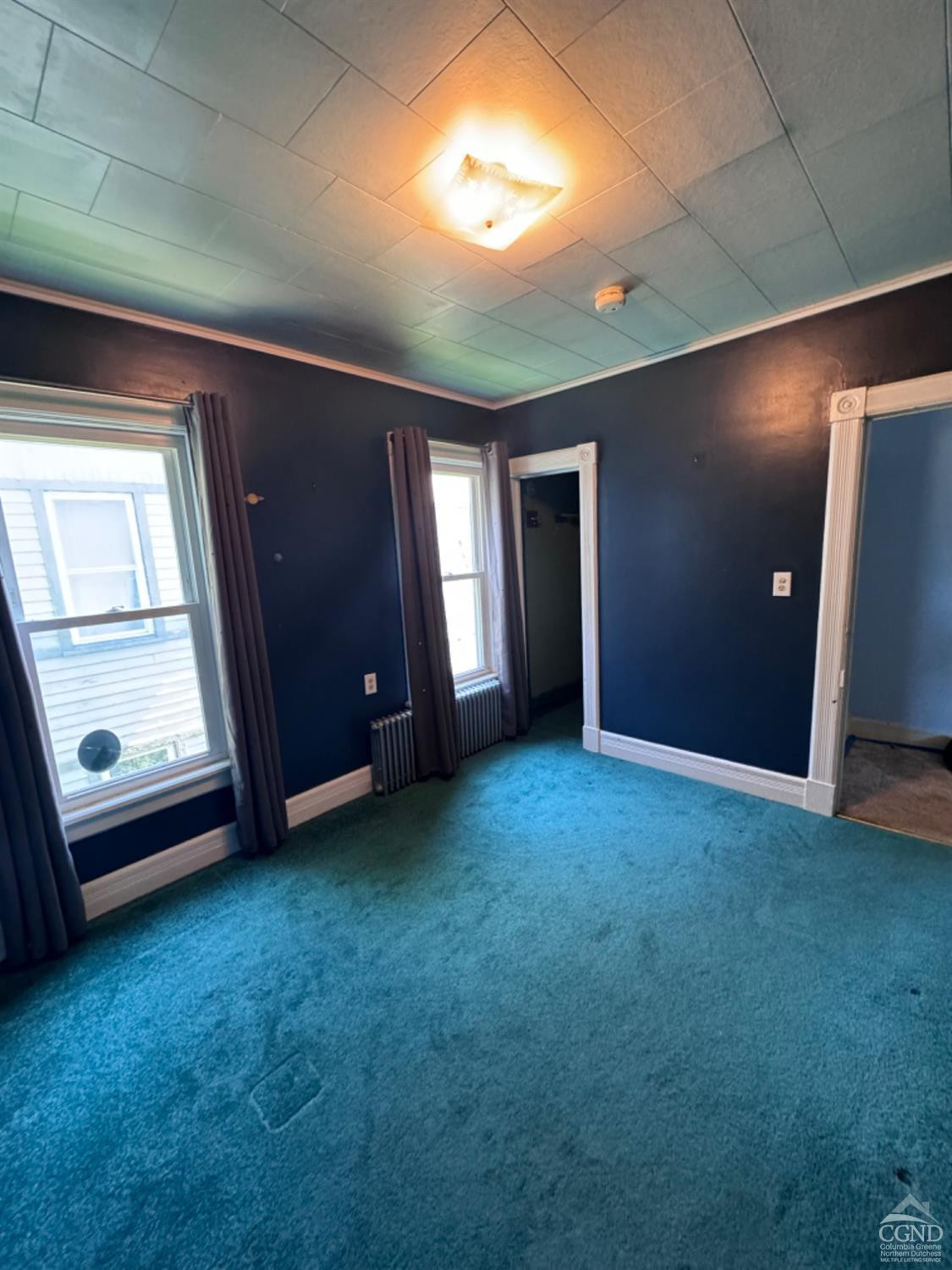 95 Maple Avenue Catskill, NY 12414 - Photo 20 of 25 an empty room with windows and closet