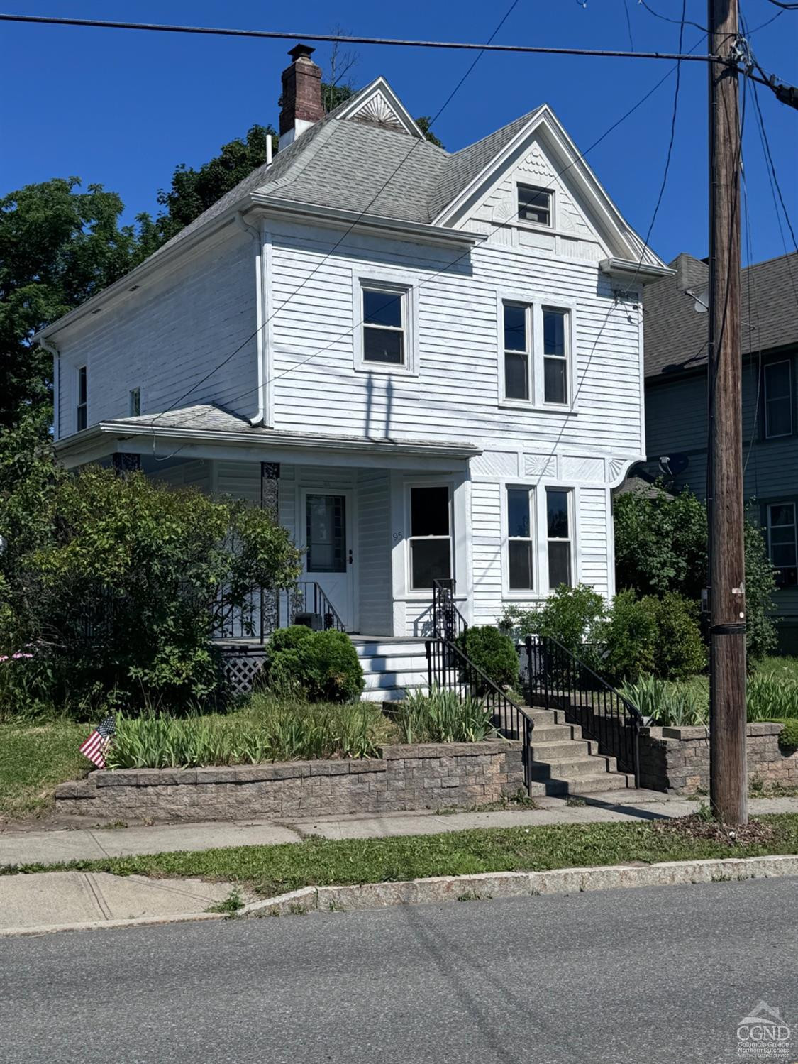 95 Maple Avenue Catskill, NY 12414 - Photo 2 of 25 a front view of a house with a yard