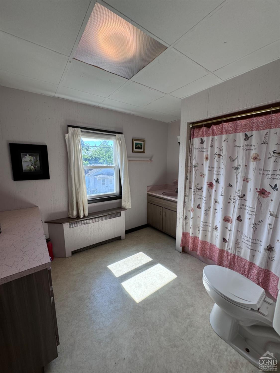 95 Maple Avenue Catskill, NY 12414 - Photo 23 of 25 a living room with furniture and a window