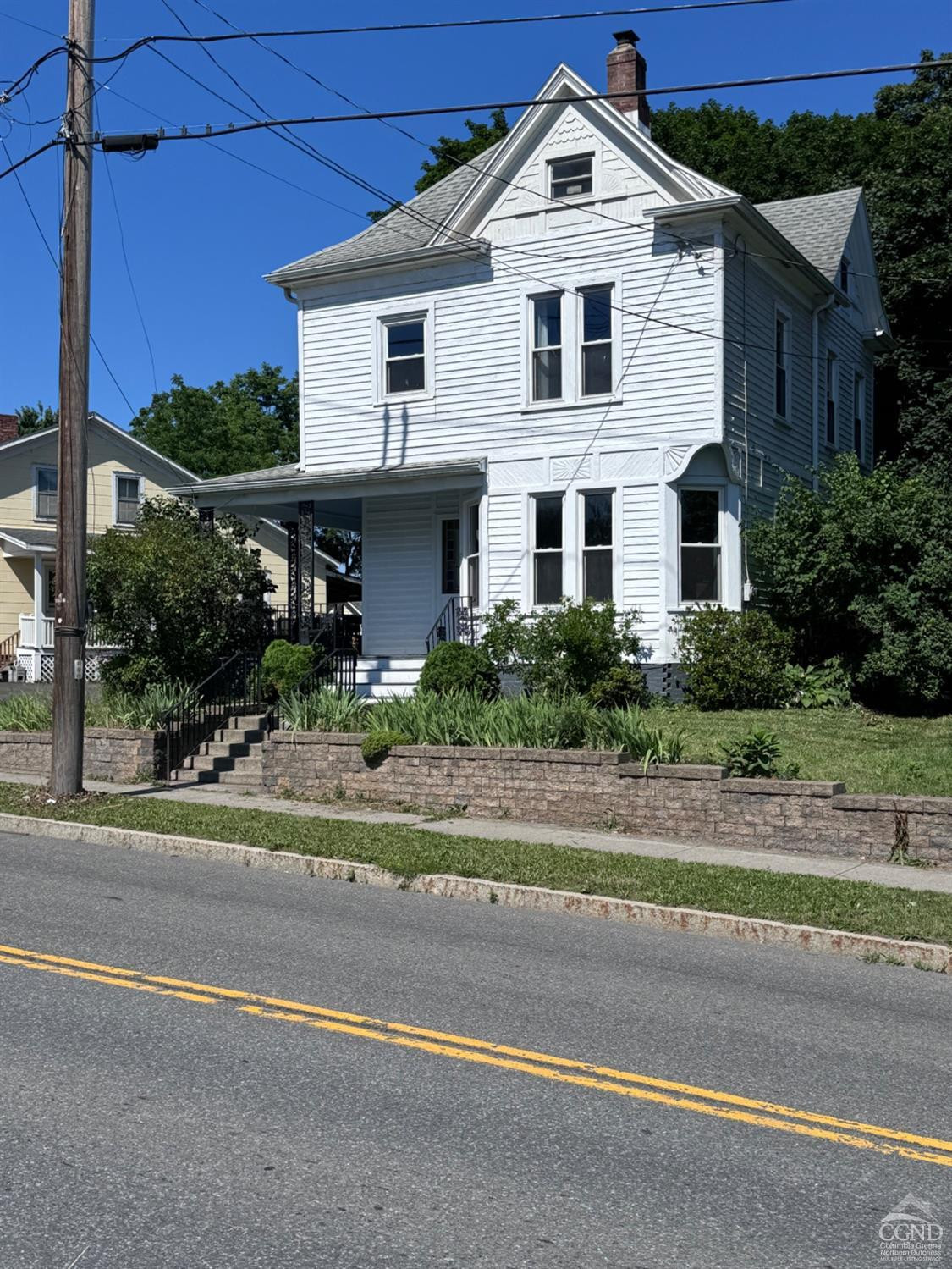 95 Maple Avenue Catskill, NY 12414 - Photo 3 of 25 a front view of a house with a yard
