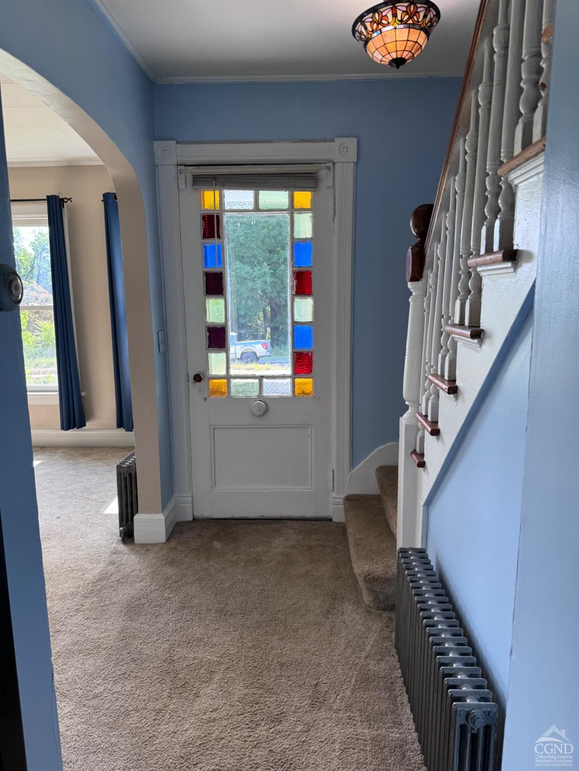 95 Maple Avenue Catskill, NY 12414 - Photo 7 of 25 a view of an entryway with wooden floor and windows