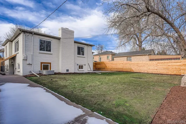 a view of a backyard of house