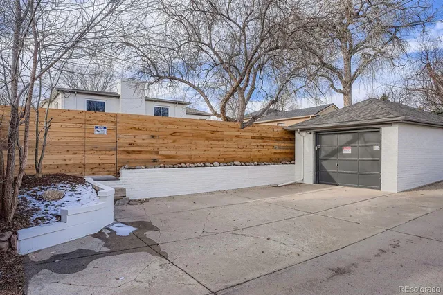 a front view of a house with a garage