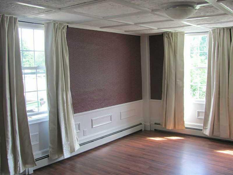 1148 Farmington Falls Road Farmington, ME 04938 - Photo 3 of 33 Living Room. Note new laminate flooring.