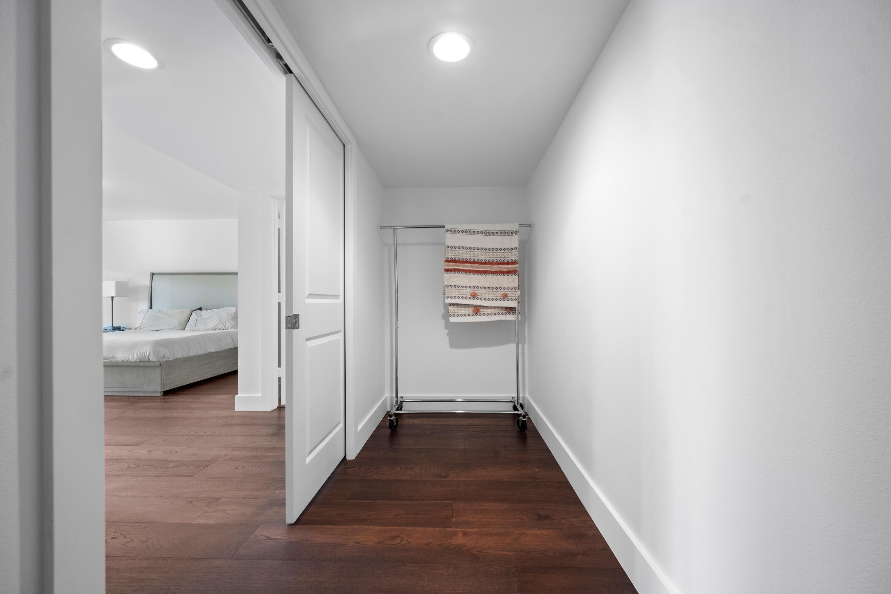 13388 Polo Road West, Unit 201 Wellington, FL 33414 - Photo 10 of 19 a view of a hallway with a livingroom and a bathroom with a sink