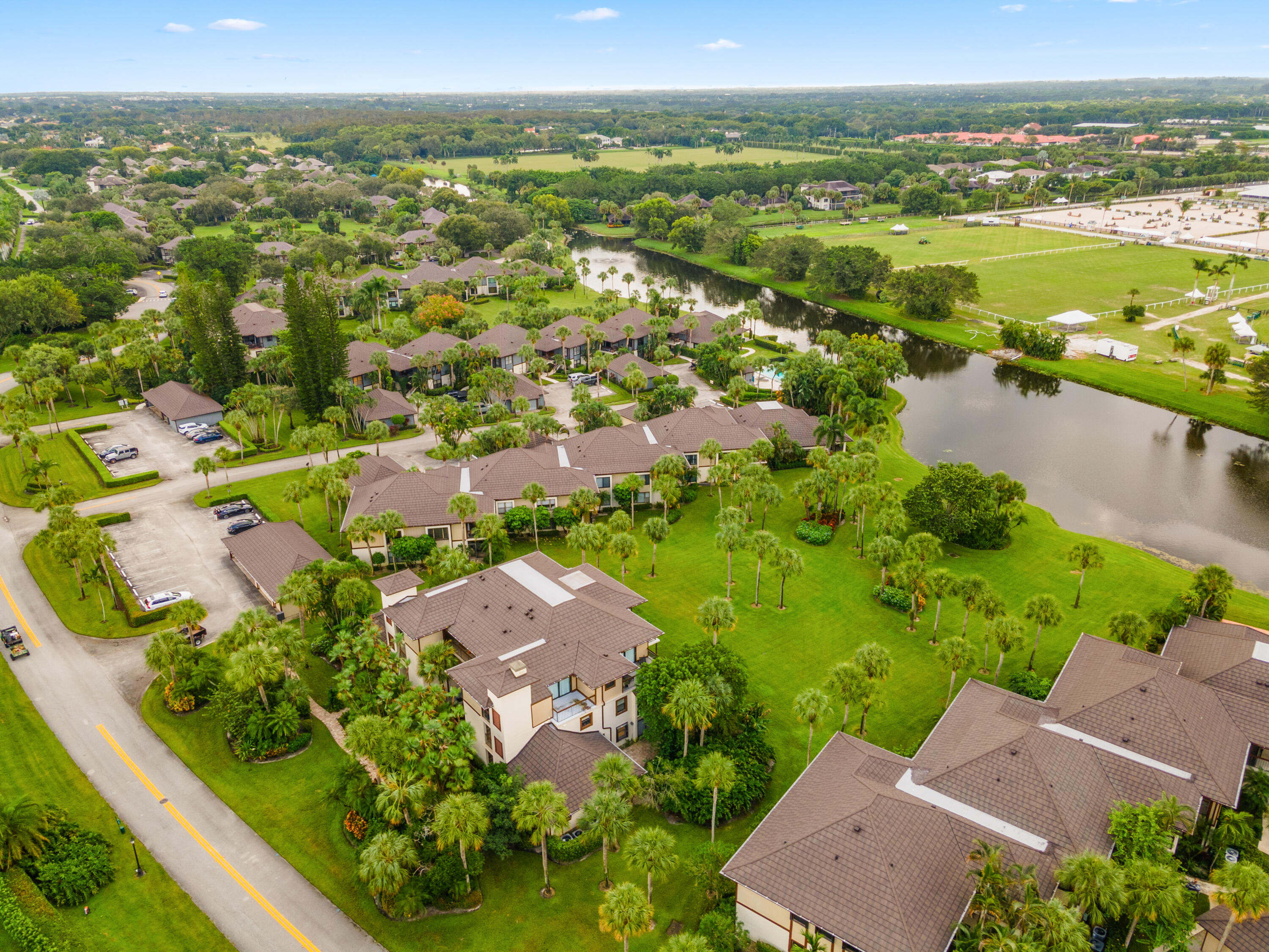 13388 Polo Road West, Unit 201 Wellington, FL 33414 - Photo 17 of 19 an aerial view of residential houses with outdoor space