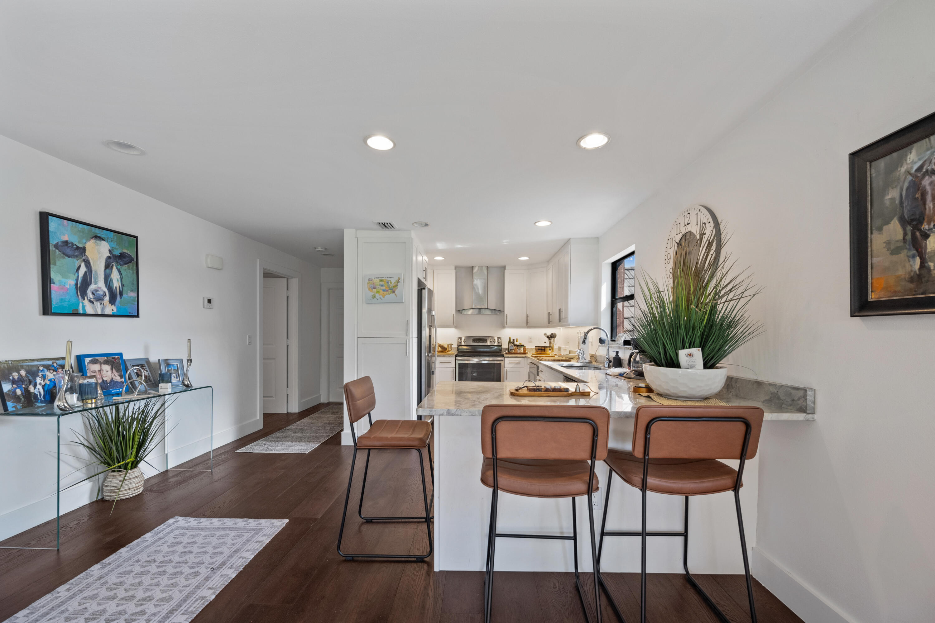 13388 Polo Road West, Unit 201 Wellington, FL 33414 - Photo 2 of 19 a living room with furniture and wooden floor