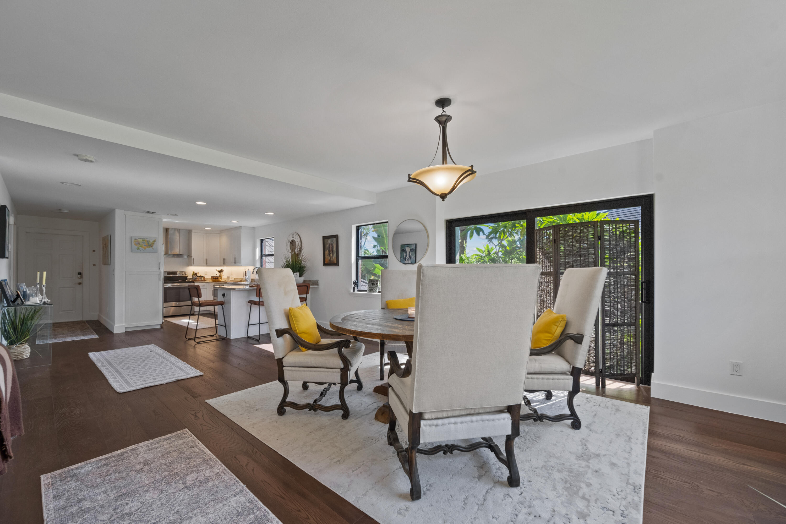 13388 Polo Road West, Unit 201 Wellington, FL 33414 - Photo 4 of 19 a workspace with furniture and a table