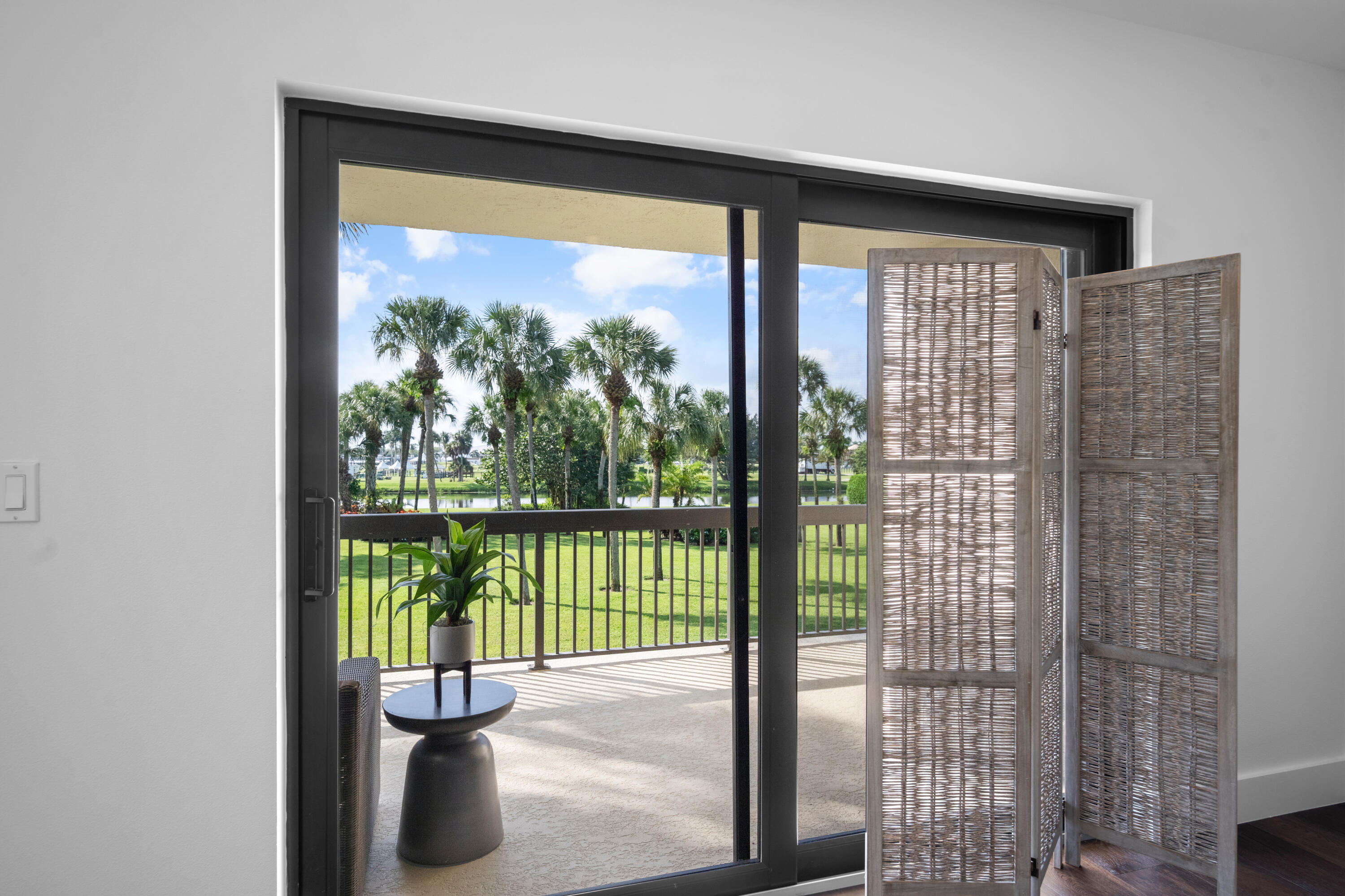 13388 Polo Road West, Unit 201 Wellington, FL 33414 - Photo 9 of 19 a view of a city from a balcony