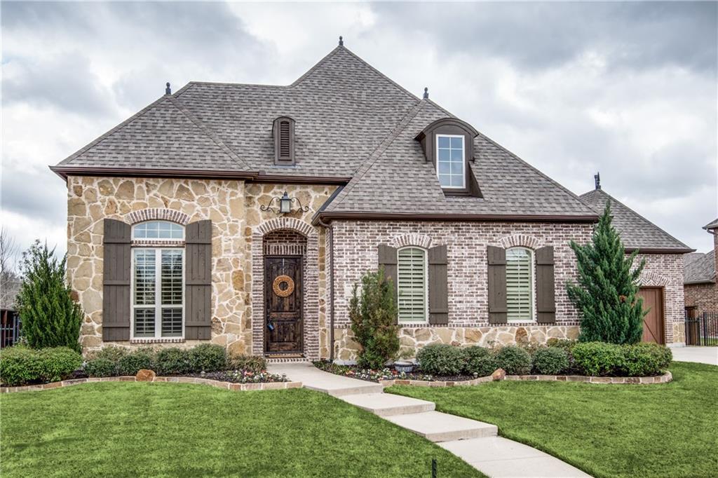 580 Butchart Drive Prosper, TX 75078 - Photo 1 of 1 a front view of a house with a yard