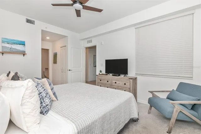 a view of a room that has a window in it